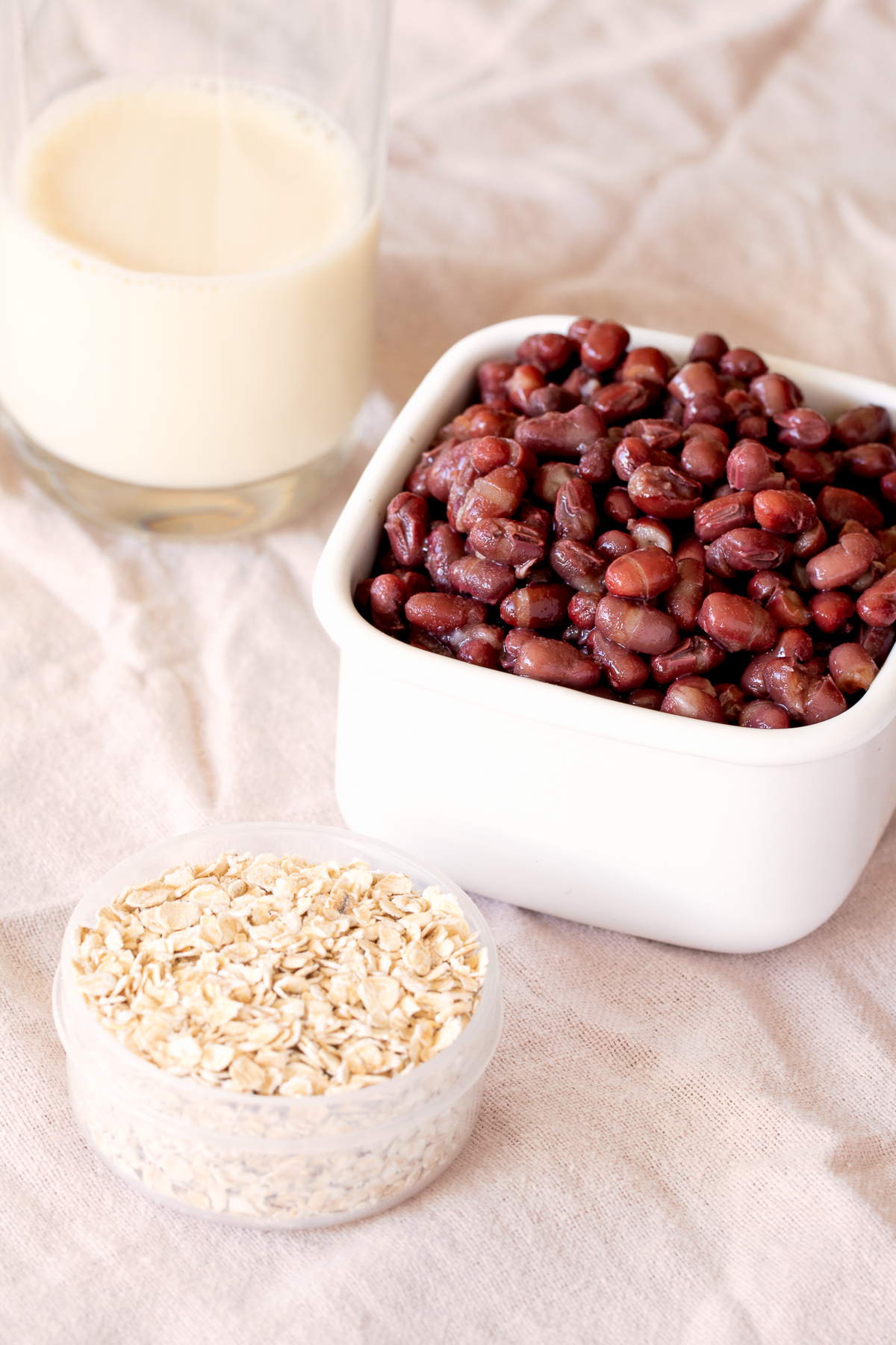 ingredients for red bean oatmeal — adzuki beans, oats, and soy milk