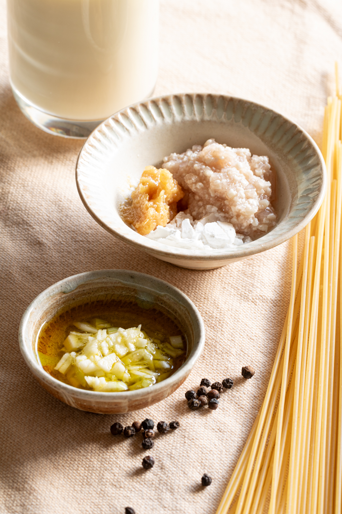 Vegan Cream Pasta Ingredients.Soy milk, pasta, black pepper, onion koji, miso, rice flour, olive oil, garlic.