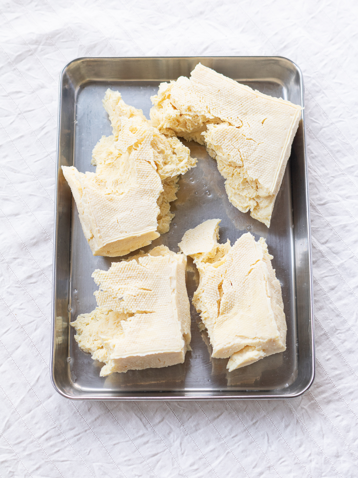 Frozen cotton (momen) tofu torn into large pieces