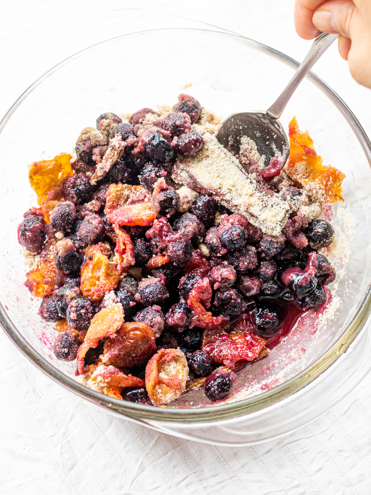 well mixed Fruits and sugar to release their juices