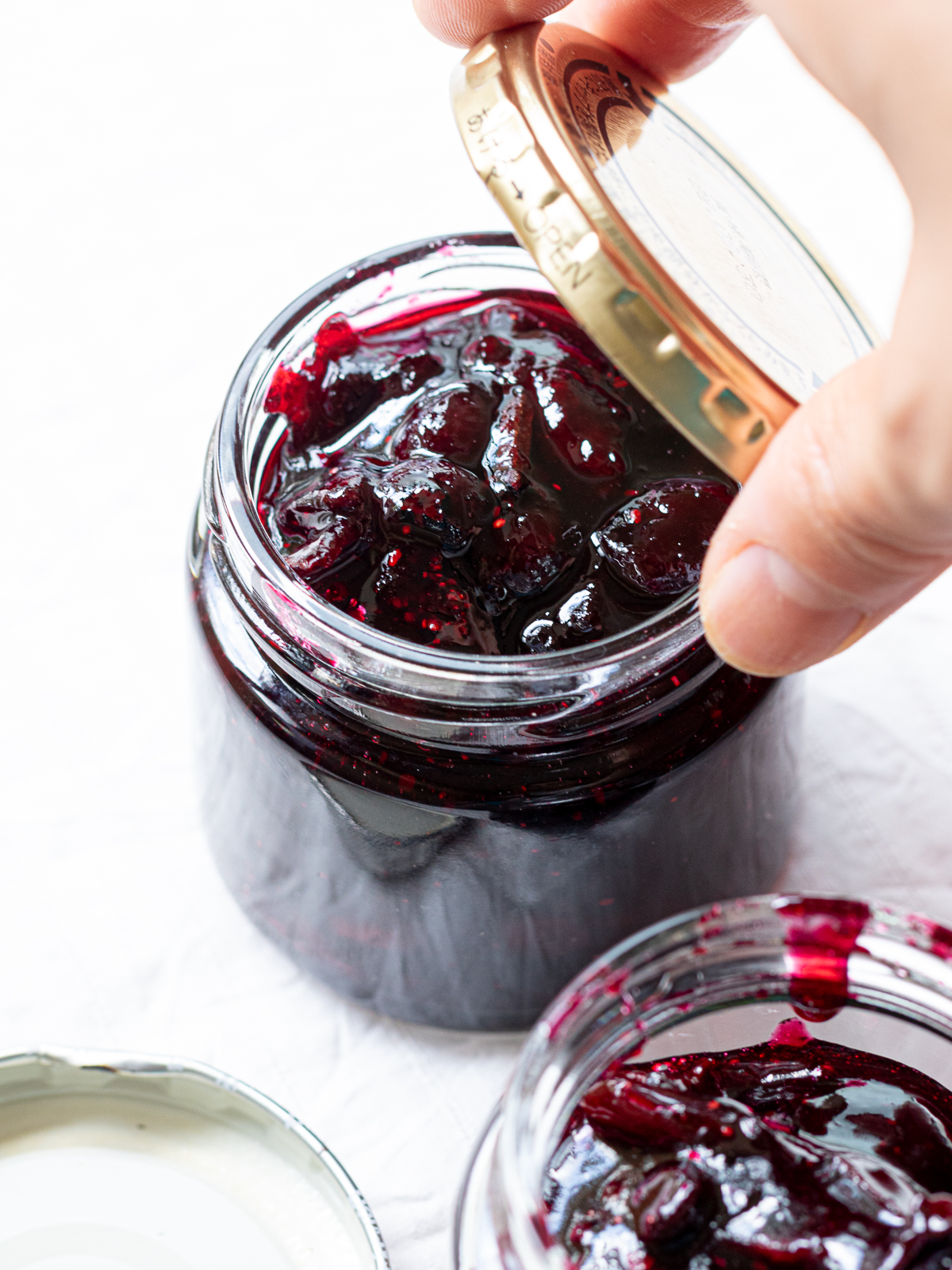 sealed plum jam in a sterilized jar
