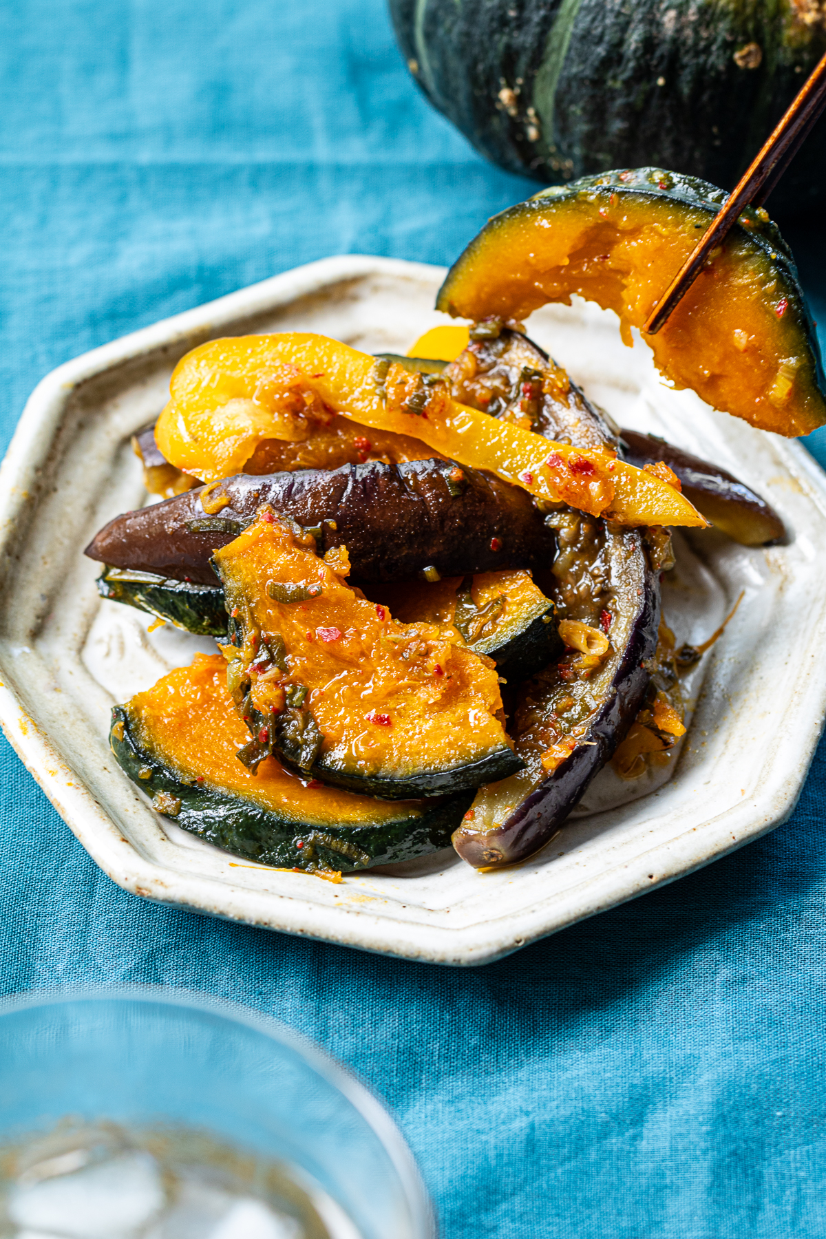 Colorful summer vegetable dish with kabocha and eggplant in a Japanese-style vegan marinade