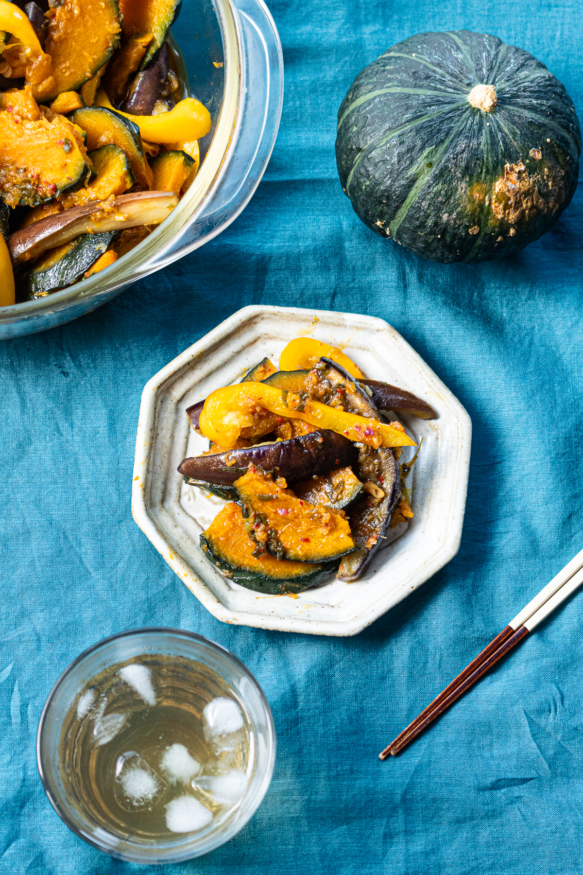 Roasted kabocha and eggplant soaking in a soy-ginger marinade, served chilled as yakibitashi