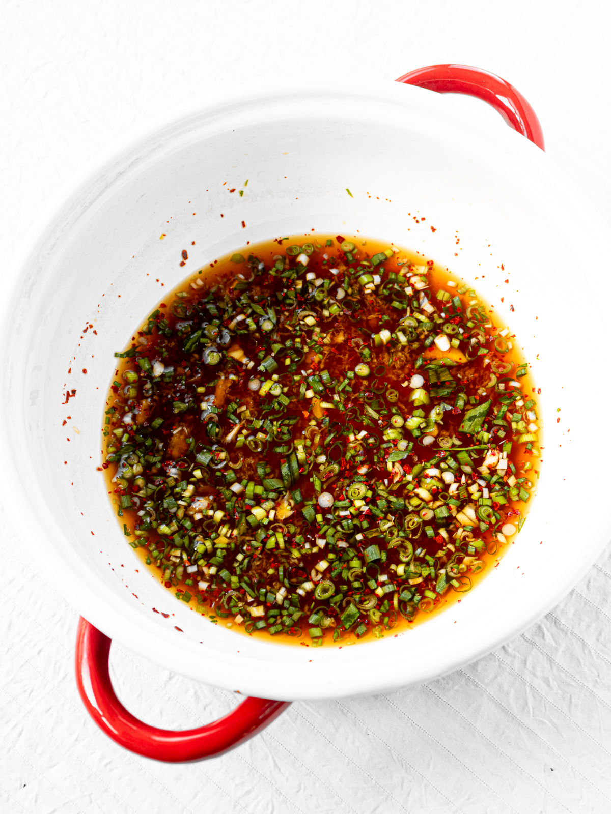 All marinade ingredients for ethnic-style yakibitashi in a pot