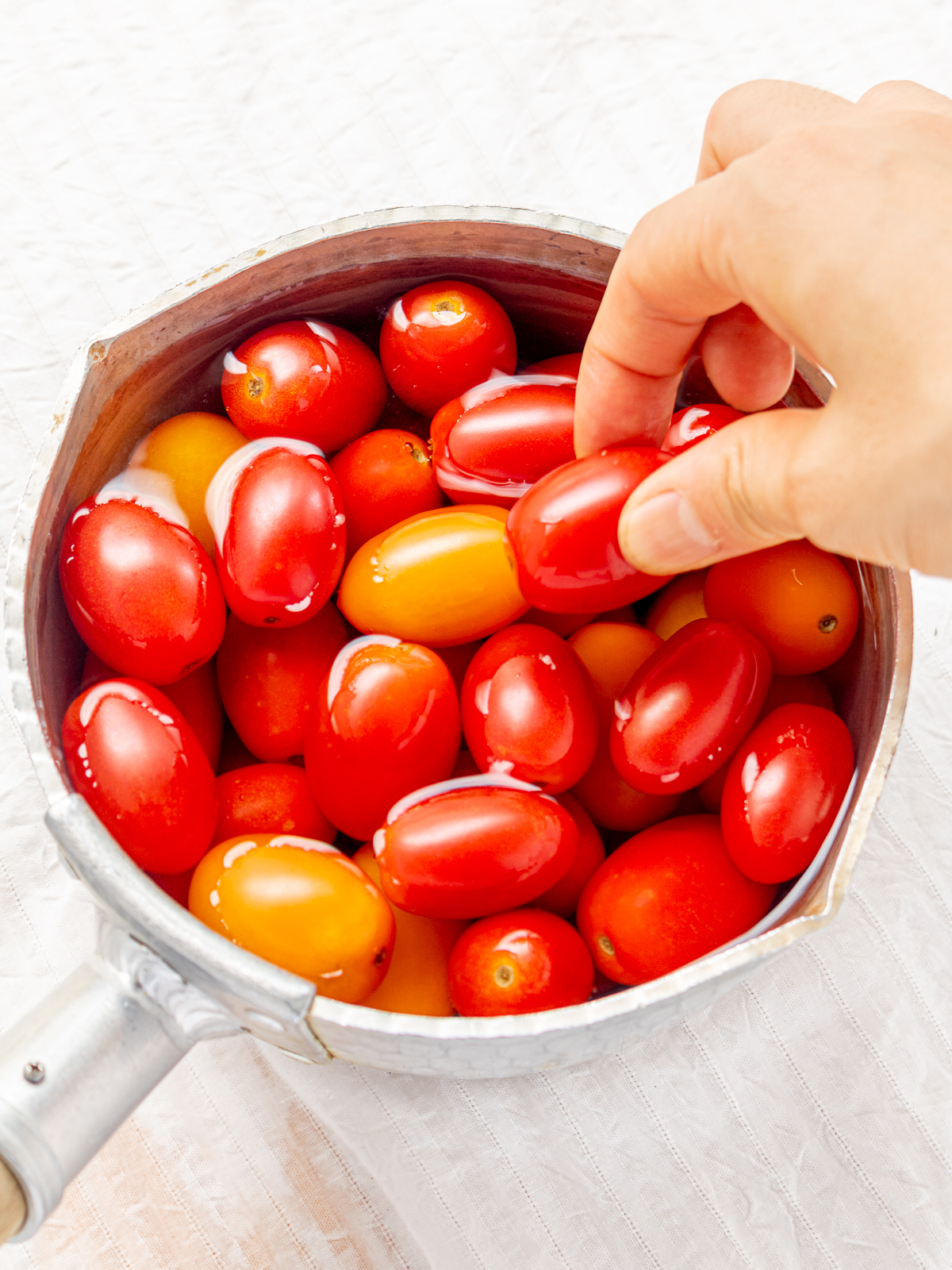 Boiling Water with Cherry Tomatoes – Preparing for Easy Tomato Peeling