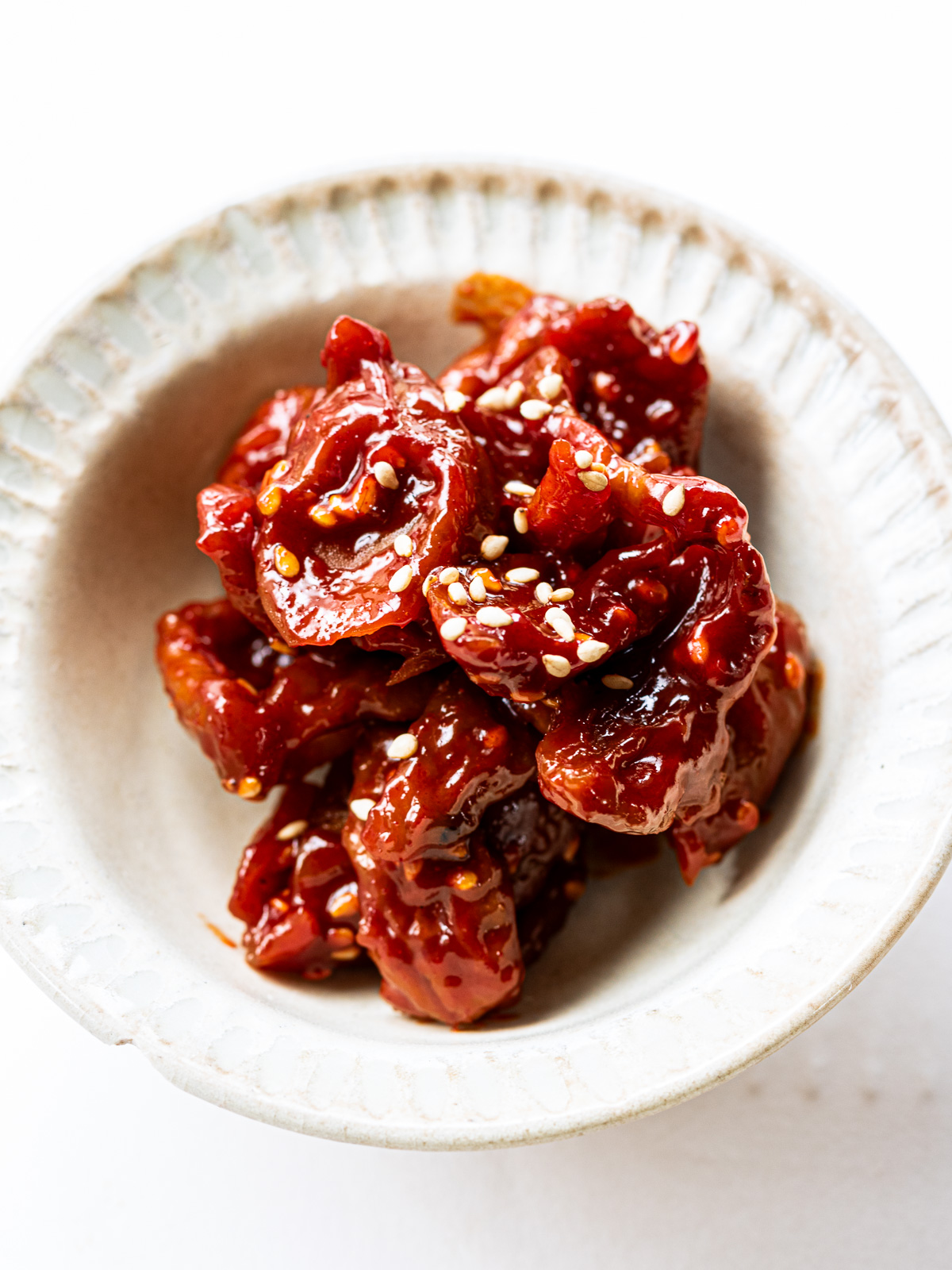 Maesil jangajji seasoned with sesame oil, soy sauce, and toasted sesame seeds