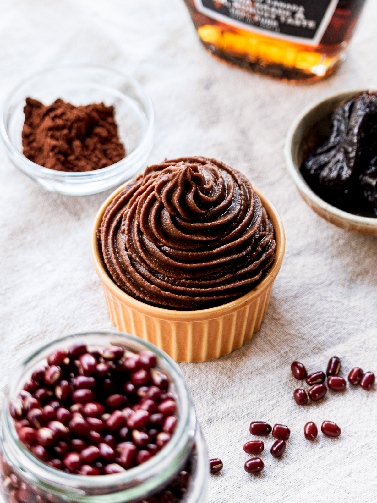 smooth vegan chocolate frosting piped neatly, made without dairy, soy, or coconut cream