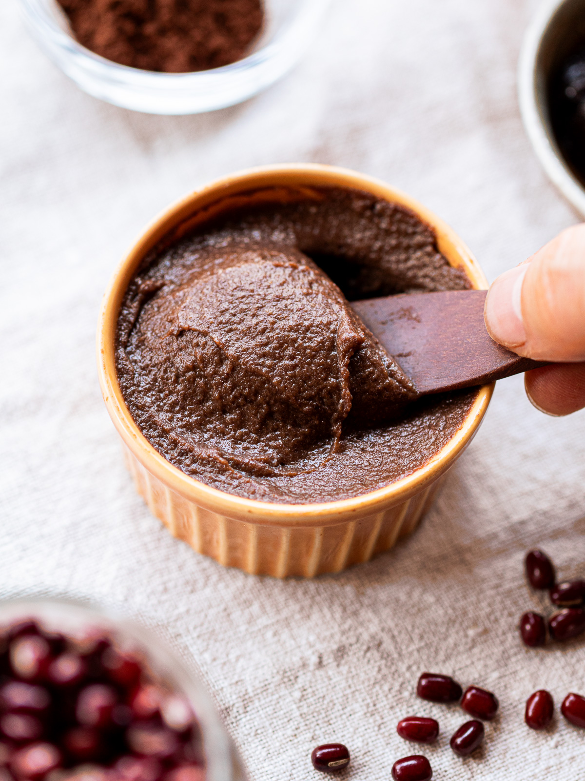 vegan chocolate frosting made with adzuki beans in a small bowl, smooth and creamy