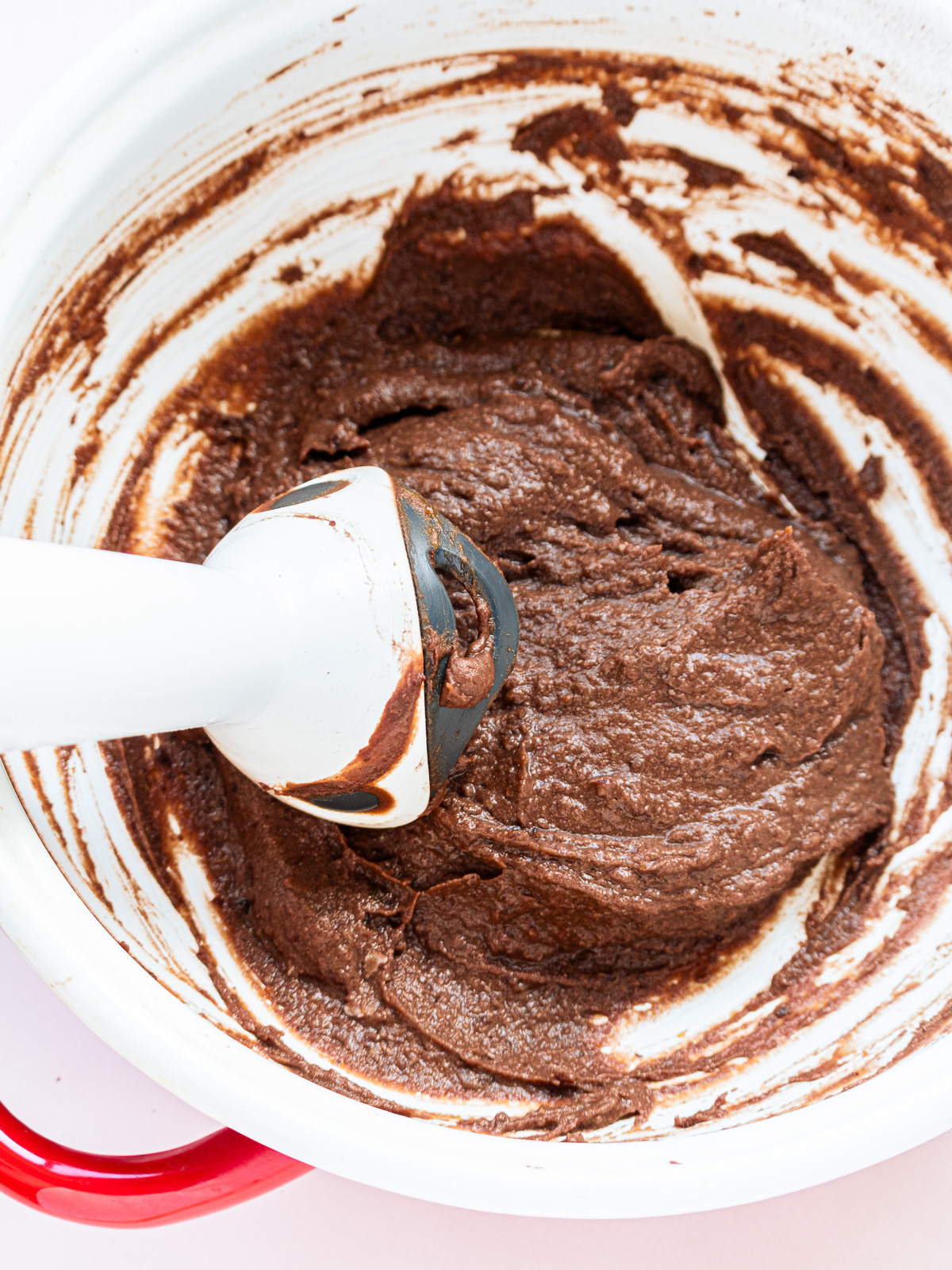 blending vegan chocolate frosting made with adzuki beans until smooth