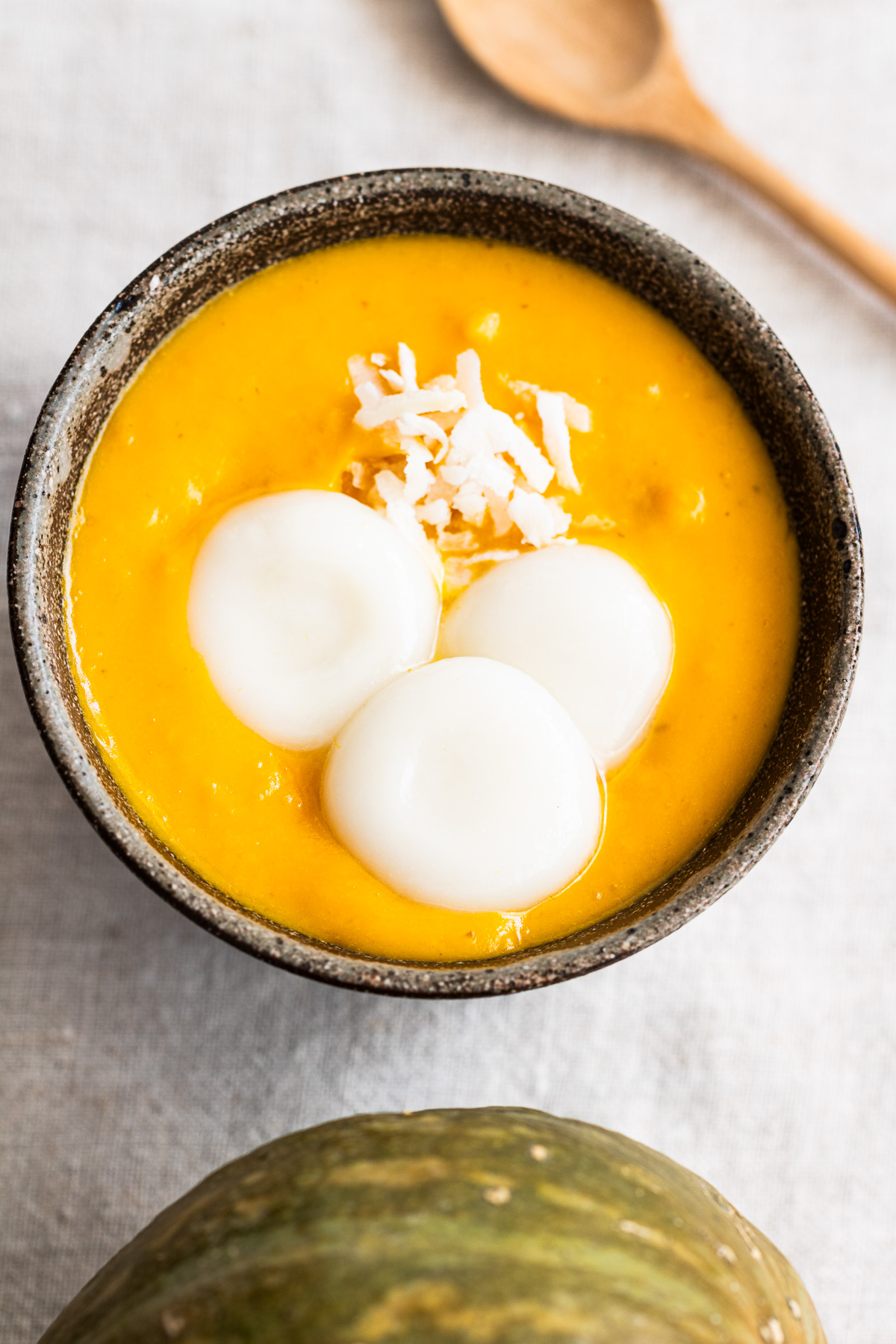 bowl of kabocha oshiruko topped with shiratama mochi