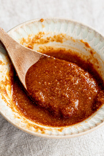 Bowl of mild vegan bibimbap sauce with soy sauce, gochujang, and sesame—perfect for Korean-style rice bowls and salads