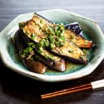 Pan-seared eggplant topped with garlic chive and ginger marinade – a simple vegan summer side dish with maesil syrup.