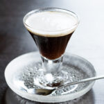 A refreshing vegan coffee jelly made with agar, served in a glass bowl. Firm texture perfect for summer desserts.