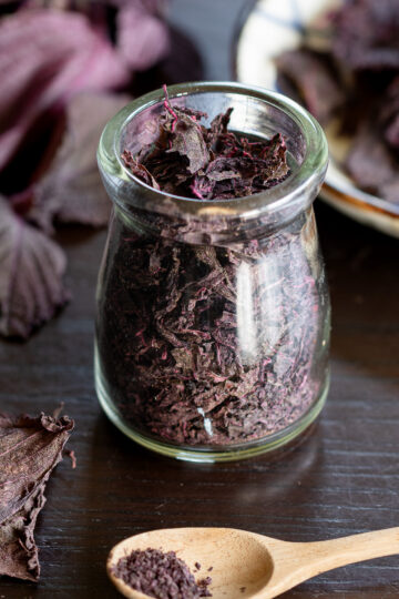 Vibrant deep red homemade low-sodium yukari furikake, perfect vegan Japanese seasoning.