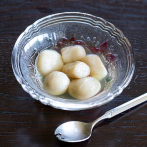 Chewy vegan banana shiratama dumplings served with refreshing ginger syrup — a light Japanese summer dessert.