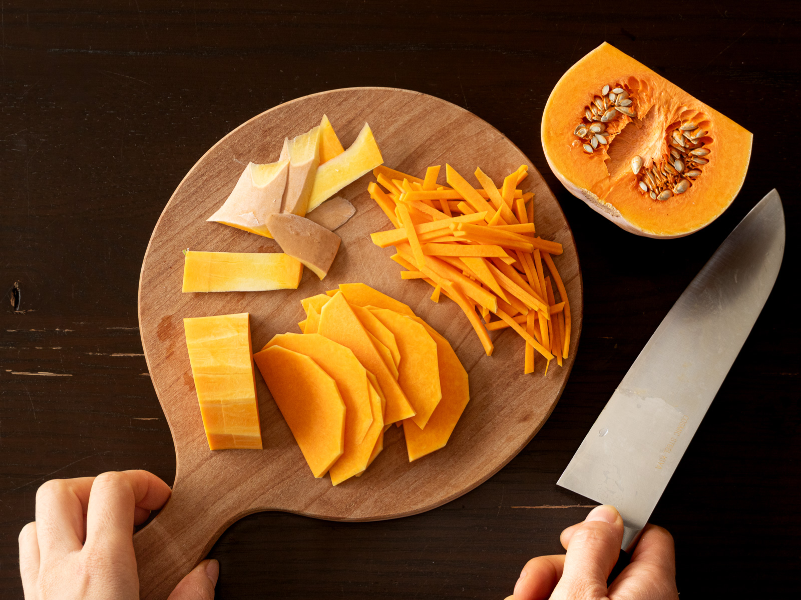 Peeled butternut squash cut into fine julienne for vegan Korean pancake (jeon), ready to cook