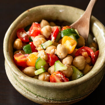 Mediterranean chickpea salad served in a bowl — vegan and dairy-free