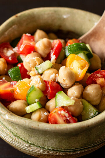 Mediterranean chickpea salad served in a bowl — vegan and dairy-free