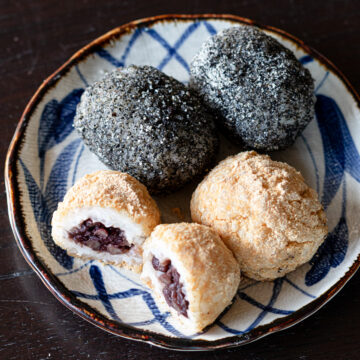 Kinako and black sesame mochi (ohagi) with anko tucked inside, lightly sweetened