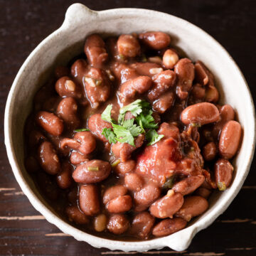 Japanese-inspired pinto bean stew with tomatoes and shio koji served in a bowl