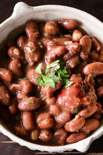 Japanese-inspired pinto bean stew with tomatoes and shio koji served in a bowl