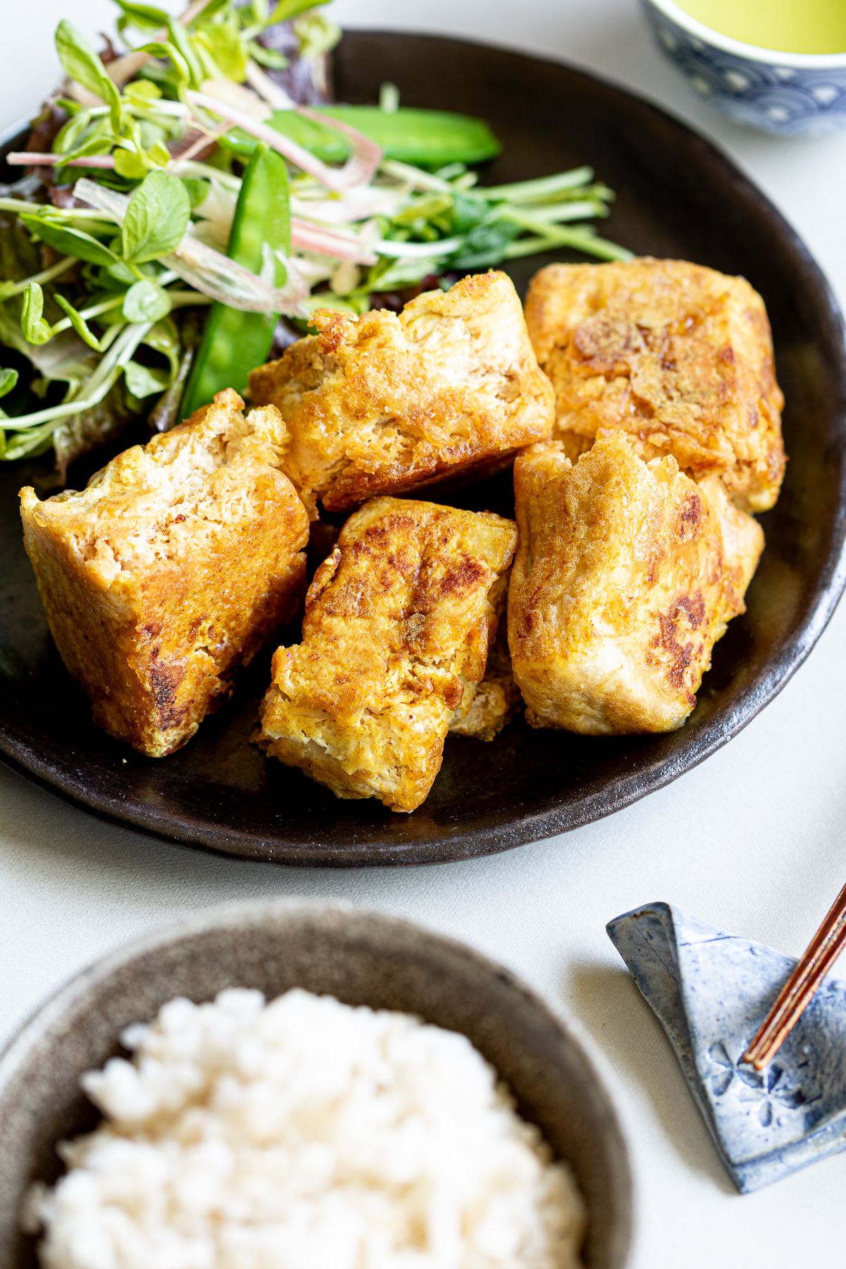 A hearty vegan dish, Curry flavored vegan fried tofu karaage with frozen tofu.