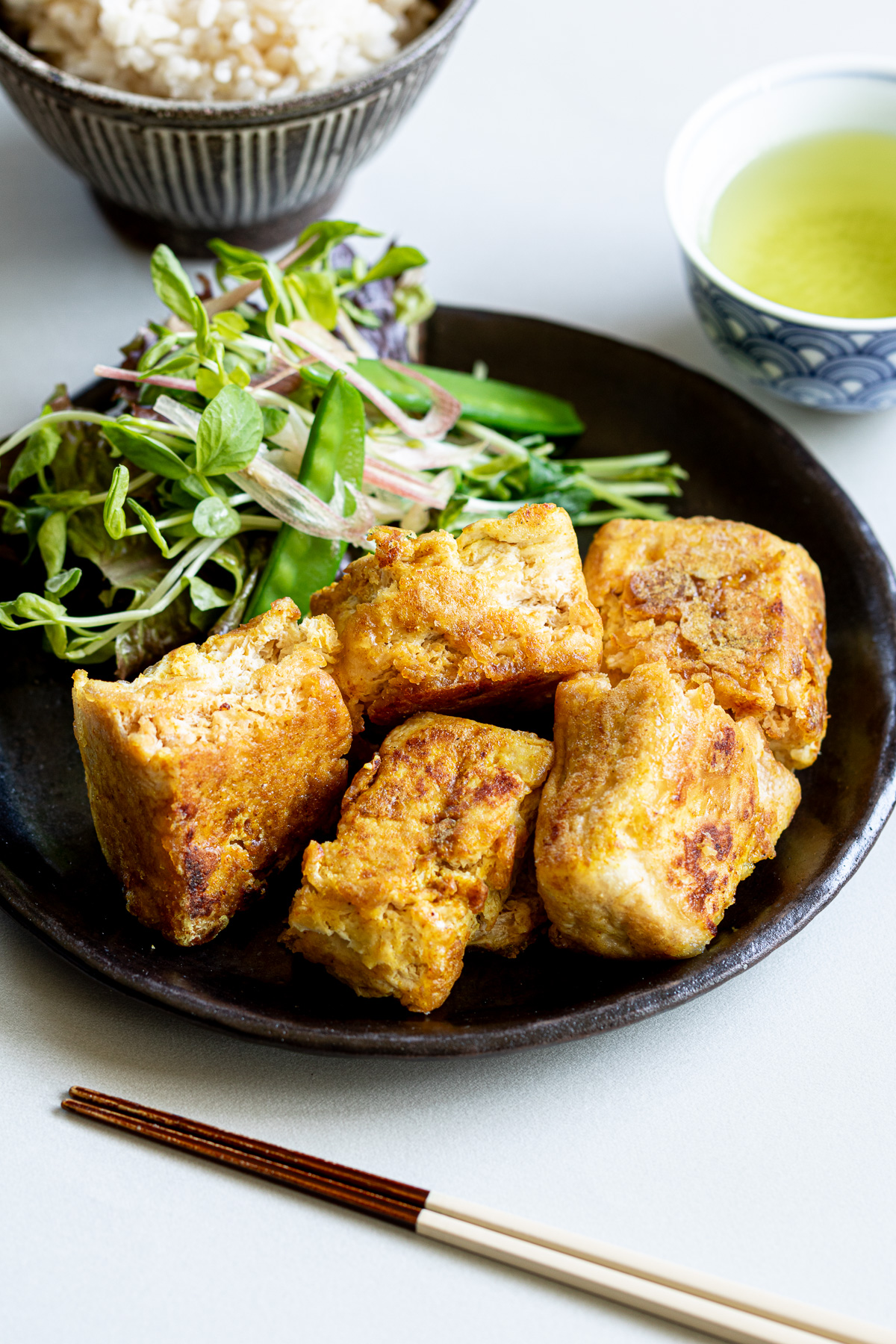 A hearty vegan side dish. Curry flavored vegan fried tofu(vegan fried chicken).