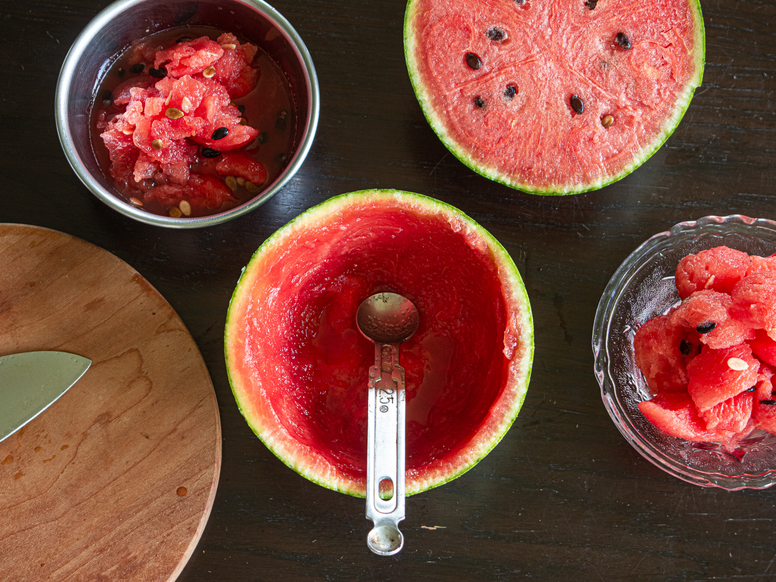 Use the hollowed watermelon as a natural bowl for vegan fruit punch, keeping the watermelon balls and juice separate