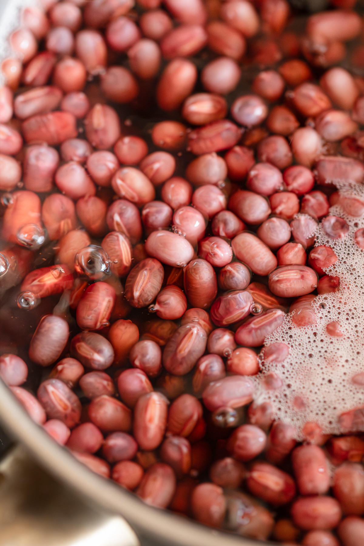 Adzuki bean skins beginning to smooth out during the plumping stage