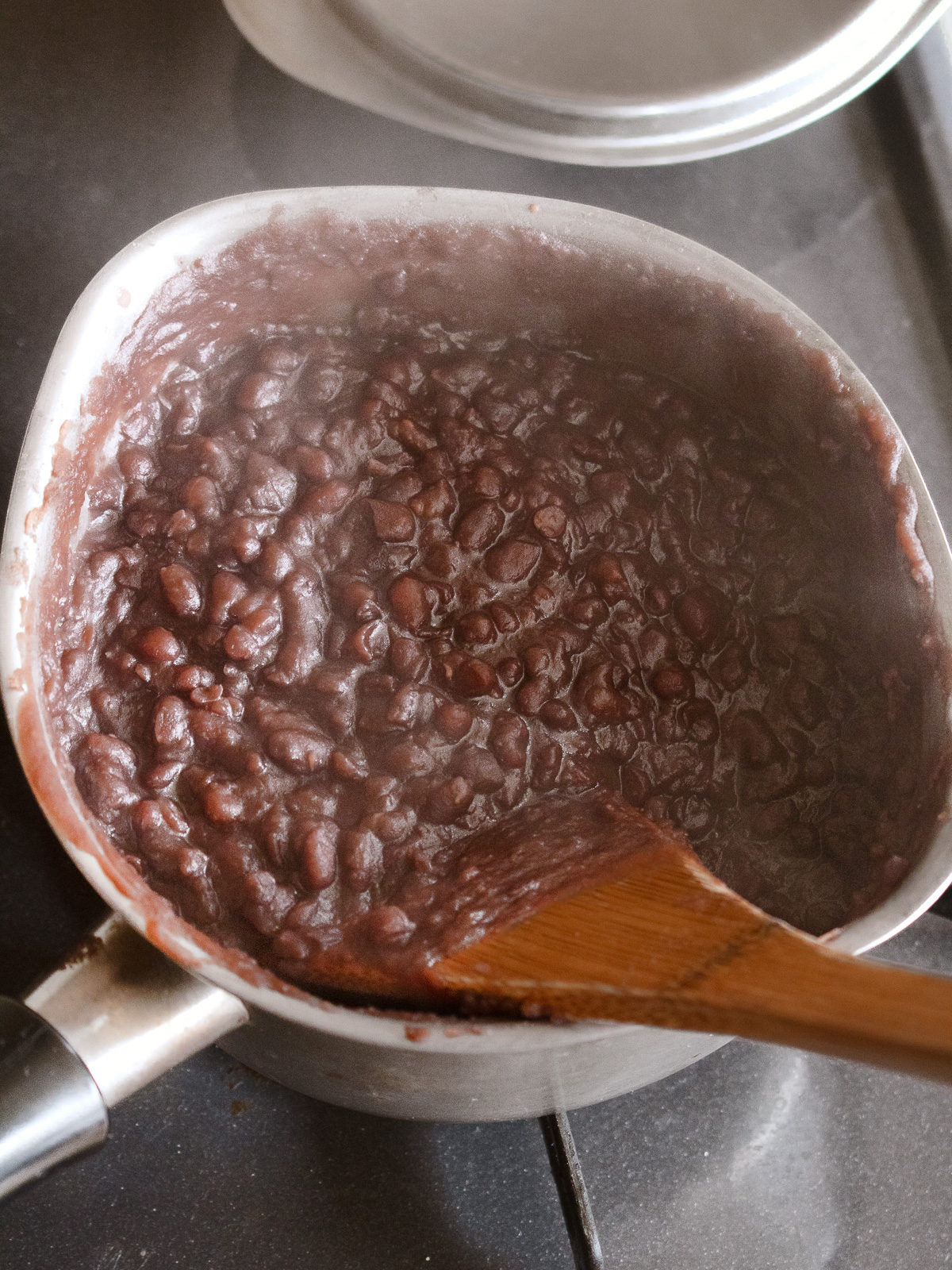 Simmering adzuki bean paste over low heat